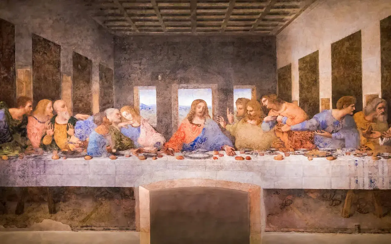 Das letzte Abendmahl in Mailand: Jesus sitzt mit seinen Jüngern am Tisch, die Emotionen sind greifbar.